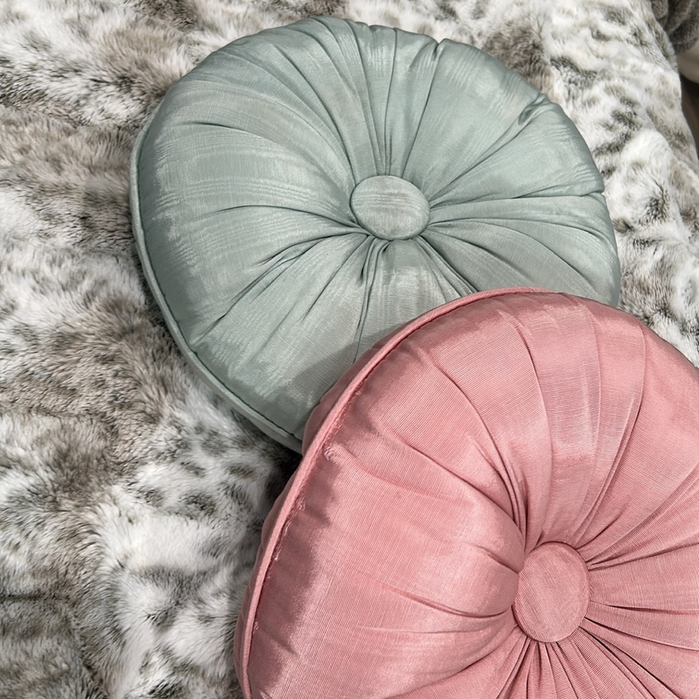 (2) vintage round pillows